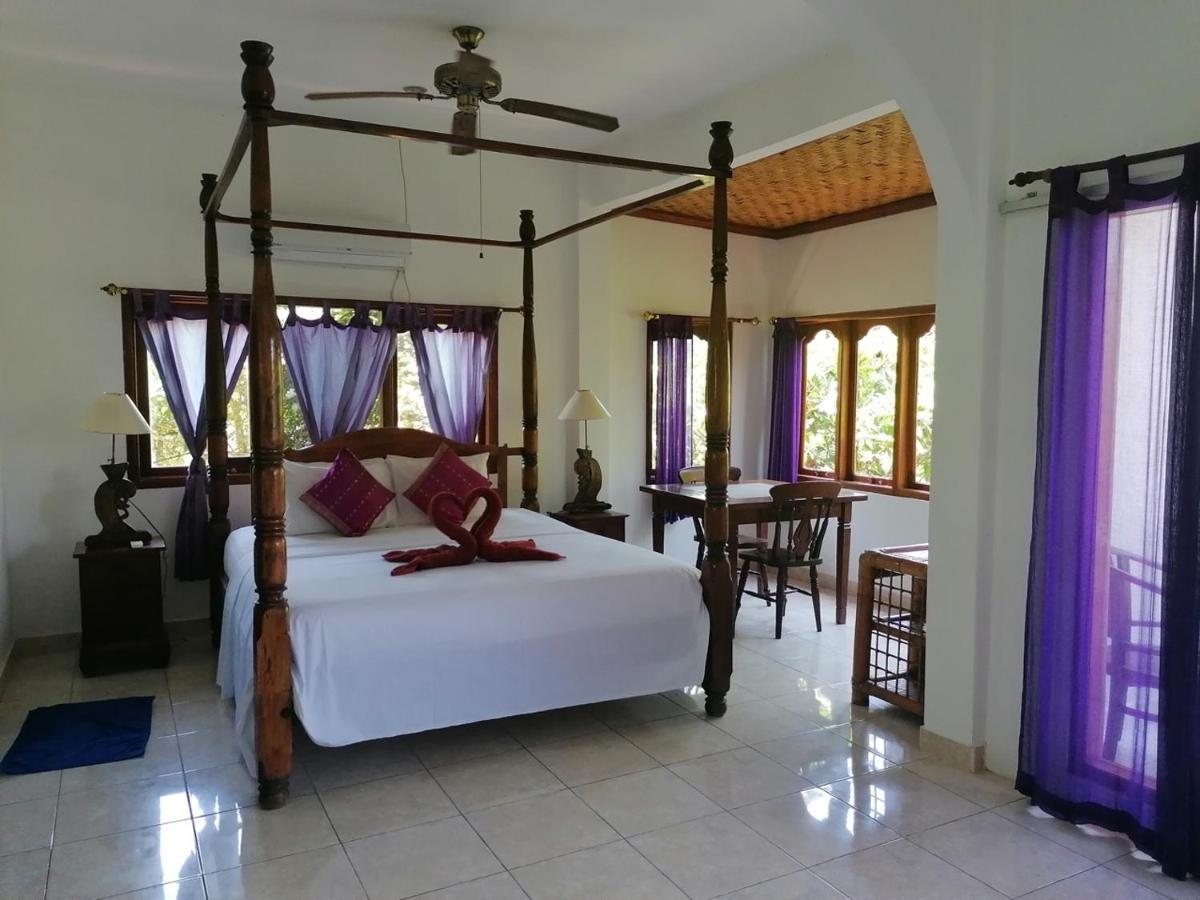 Puri Oka Beach Bungalows Кандидаса Экстерьер фото